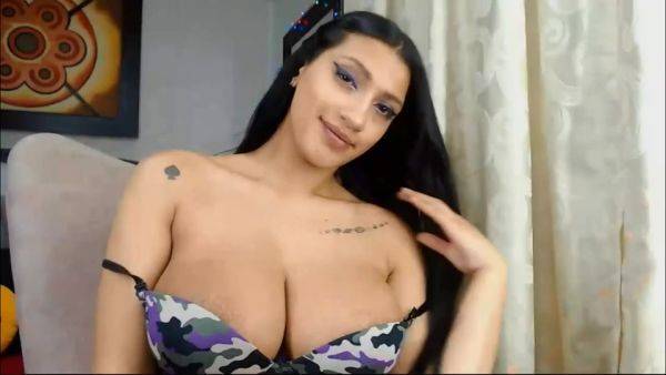 Busty Latina Babe Teaes In Front Of Webcam on royalboobs.com